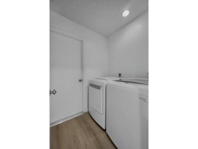 Don't miss this beautifully renovated, single-story corner on Martin Downs Country Club in Florida - for sale on GolfHomes.com, golf home, golf lot