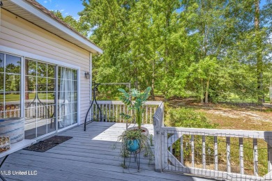 Step into this beautiful home right on the GOLF COURSE with high on Diamondhead Country Club in Mississippi - for sale on GolfHomes.com, golf home, golf lot