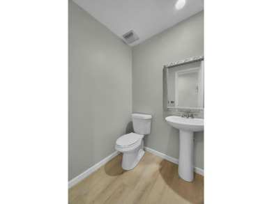 Don't miss this beautifully renovated, single-story corner on Martin Downs Country Club in Florida - for sale on GolfHomes.com, golf home, golf lot