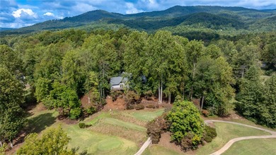 Step into serenity at 2111 Moorefield Memorial Highway, where on The Rock At Jocassee in South Carolina - for sale on GolfHomes.com, golf home, golf lot