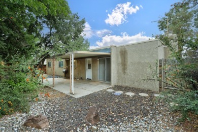 Location, Location, Location! This lovely 3/4 bedroom, 2 bath, 2 on Arroyo Del Oso Golf Course in New Mexico - for sale on GolfHomes.com, golf home, golf lot