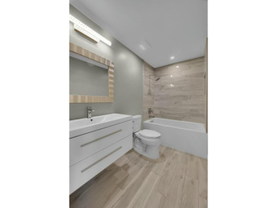 Don't miss this beautifully renovated, single-story corner on Martin Downs Country Club in Florida - for sale on GolfHomes.com, golf home, golf lot
