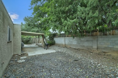 Location, Location, Location! This lovely 3/4 bedroom, 2 bath, 2 on Arroyo Del Oso Golf Course in New Mexico - for sale on GolfHomes.com, golf home, golf lot