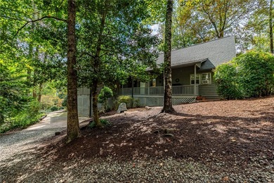 Step into serenity at 2111 Moorefield Memorial Highway, where on The Rock At Jocassee in South Carolina - for sale on GolfHomes.com, golf home, golf lot