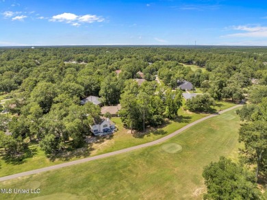 Step into this beautiful home right on the GOLF COURSE with high on Diamondhead Country Club in Mississippi - for sale on GolfHomes.com, golf home, golf lot