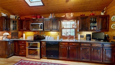 Step into serenity at 2111 Moorefield Memorial Highway, where on The Rock At Jocassee in South Carolina - for sale on GolfHomes.com, golf home, golf lot