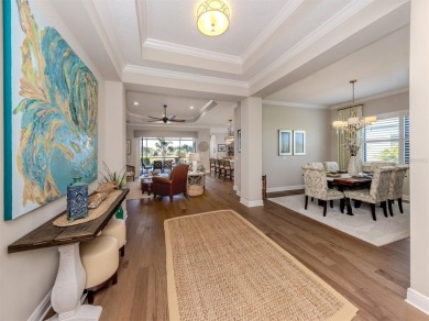 Come on into a beautiful, sophisticated coastal, Sea Star model on Boca Royale Golf and Country Club in Florida - for sale on GolfHomes.com, golf home, golf lot