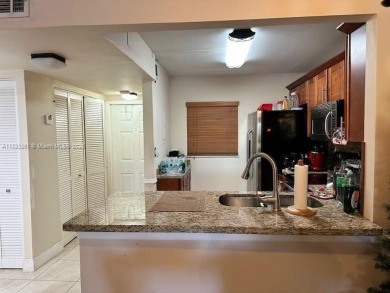 Beautiful condo in the heart of Pembroke Pines! First Floor on Pembroke Lakes Golf Club in Florida - for sale on GolfHomes.com, golf home, golf lot