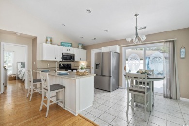 Located in the gated Myrtle Beach Golf & Yacht Club community on Heron Point Golf Club in South Carolina - for sale on GolfHomes.com, golf home, golf lot