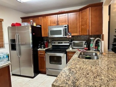 Beautiful condo in the heart of Pembroke Pines! First Floor on Pembroke Lakes Golf Club in Florida - for sale on GolfHomes.com, golf home, golf lot