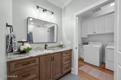 Nestled in the prestigious gated community of River Landing on River Landing Golf Course in North Carolina - for sale on GolfHomes.com, golf home, golf lot