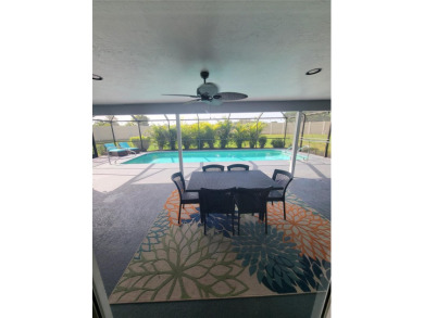 This pool home is an amazing value and aggressively priced to on Peridia Golf and Country Club in Florida - for sale on GolfHomes.com, golf home, golf lot