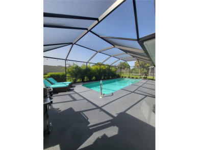 This pool home is an amazing value and aggressively priced to on Peridia Golf and Country Club in Florida - for sale on GolfHomes.com, golf home, golf lot