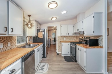 Located in the gated Pine Shadows community, you can enjoy your on Pine Shadows Golf Course in Arizona - for sale on GolfHomes.com, golf home, golf lot