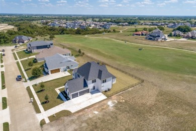 Custom Two Story along the 7th Hole of The Bridges Golf Club on The Bridges Golf Club in Texas - for sale on GolfHomes.com, golf home, golf lot