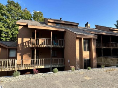 This exceptional three-bedroom, three-and-a-half bathroom condo on Shanty Creek Golf Course in Michigan - for sale on GolfHomes.com, golf home, golf lot