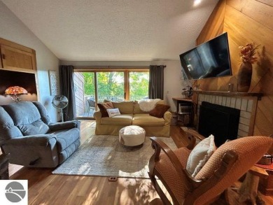 This exceptional three-bedroom, three-and-a-half bathroom condo on Shanty Creek Golf Course in Michigan - for sale on GolfHomes.com, golf home, golf lot