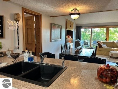 This exceptional three-bedroom, three-and-a-half bathroom condo on Shanty Creek Golf Course in Michigan - for sale on GolfHomes.com, golf home, golf lot