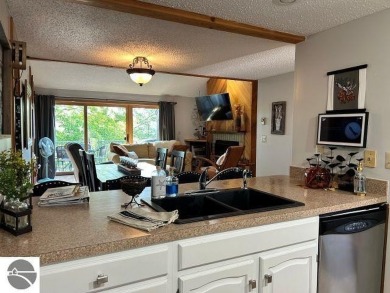 This exceptional three-bedroom, three-and-a-half bathroom condo on Shanty Creek Golf Course in Michigan - for sale on GolfHomes.com, golf home, golf lot