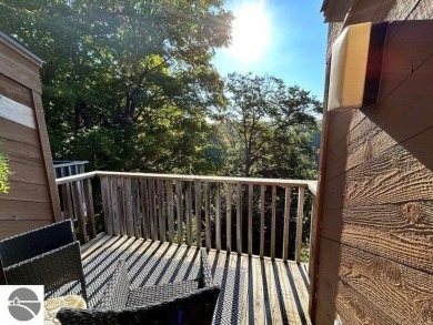 This exceptional three-bedroom, three-and-a-half bathroom condo on Shanty Creek Golf Course in Michigan - for sale on GolfHomes.com, golf home, golf lot