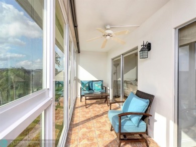 ALL IMPACT WINDOWS, PATIO  FRONT DOOR. OPEN KITCHEN REAL WOOD on Wynmoor Golf Course in Florida - for sale on GolfHomes.com, golf home, golf lot