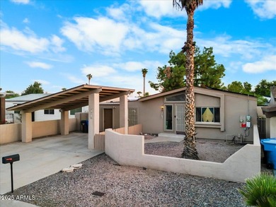 Move in ready, Mid-Century opportunity in Villa De Paz. This on Villa De Paz Golf Course in Arizona - for sale on GolfHomes.com, golf home, golf lot