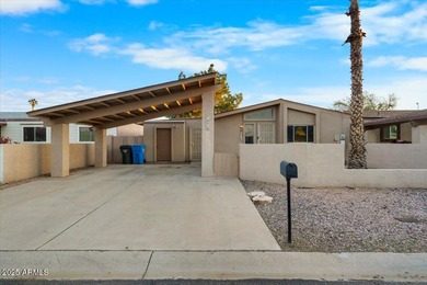 Move in ready, Mid-Century opportunity in Villa De Paz. This on Villa De Paz Golf Course in Arizona - for sale on GolfHomes.com, golf home, golf lot