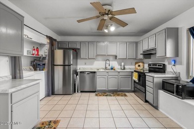 Move in ready, Mid-Century opportunity in Villa De Paz. This on Villa De Paz Golf Course in Arizona - for sale on GolfHomes.com, golf home, golf lot