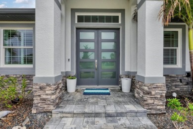 Nestled in the community of Rotonda West, this exquisite on Rotonda Golf and Country Club - Long Marsh  in Florida - for sale on GolfHomes.com, golf home, golf lot