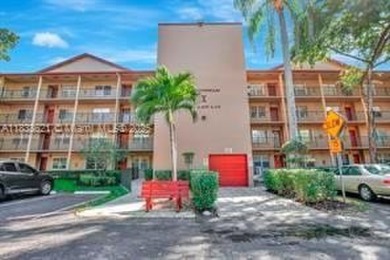 Spacious 2 bedroom 2 bath with large ENCLOSED BALCONY , storage on Flamingo Lakes Country Club in Florida - for sale on GolfHomes.com, golf home, golf lot