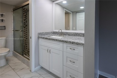 Spacious 2 bedroom 2 bath with large ENCLOSED BALCONY , storage on Flamingo Lakes Country Club in Florida - for sale on GolfHomes.com, golf home, golf lot