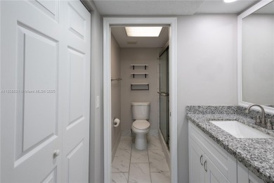 Spacious 2 bedroom 2 bath with large ENCLOSED BALCONY , storage on Flamingo Lakes Country Club in Florida - for sale on GolfHomes.com, golf home, golf lot