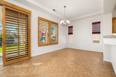 Step into timeless desert elegance at this pristine 2004 on Bermuda Dunes Country Club in California - for sale on GolfHomes.com, golf home, golf lot