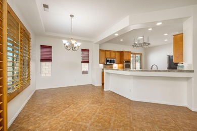 Step into timeless desert elegance at this pristine 2004 on Bermuda Dunes Country Club in California - for sale on GolfHomes.com, golf home, golf lot