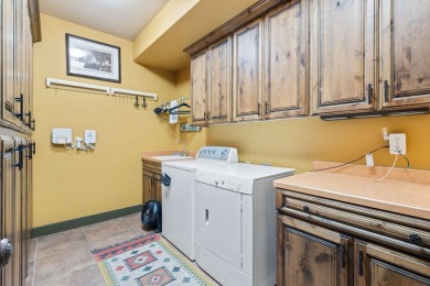 This elegant home sits on the Entrada Fairway with large windows on  in Utah - for sale on GolfHomes.com, golf home, golf lot