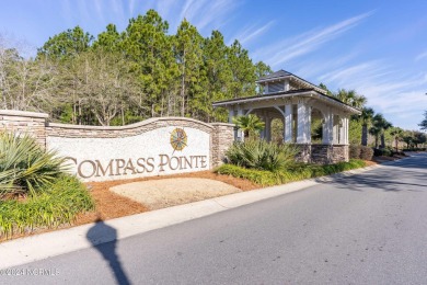 Step into luxury coastal living at its finest in this on Compass Pointe Golf Course in North Carolina - for sale on GolfHomes.com, golf home, golf lot