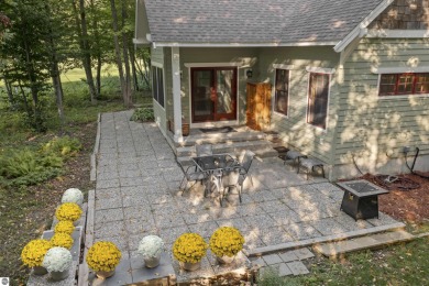 Experience year-round comfort and elegance in this like-new on Crystal Mountain Golf Course in Michigan - for sale on GolfHomes.com, golf home, golf lot