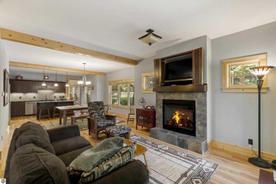 Experience year-round comfort and elegance in this like-new on Crystal Mountain Golf Course in Michigan - for sale on GolfHomes.com, golf home, golf lot