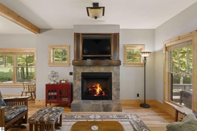 Experience year-round comfort and elegance in this like-new on Crystal Mountain Golf Course in Michigan - for sale on GolfHomes.com, golf home, golf lot