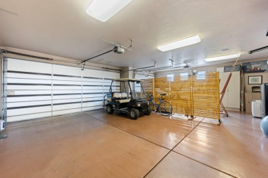 This elegant home sits on the Entrada Fairway with large windows on Entrada at Snow Canyon in Utah - for sale on GolfHomes.com, golf home, golf lot