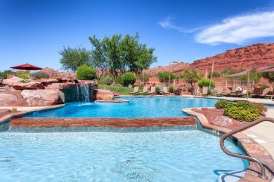 This elegant home sits on the Entrada Fairway with large windows on Entrada at Snow Canyon in Utah - for sale on GolfHomes.com, golf home, golf lot