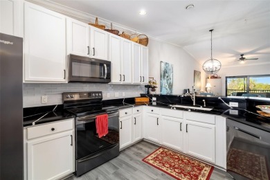 Welcome to this beautifully updated end-unit condo offering on River Strand Golf and Country Club At Heritage Harbour  in Florida - for sale on GolfHomes.com, golf home, golf lot