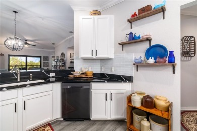 Welcome to this beautifully updated end-unit condo offering on River Strand Golf and Country Club At Heritage Harbour  in Florida - for sale on GolfHomes.com, golf home, golf lot