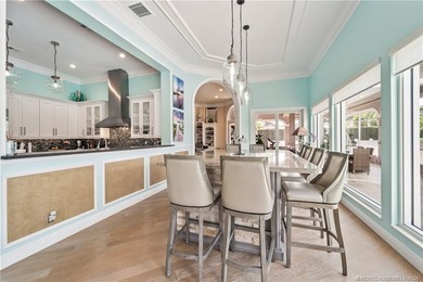 This stunning home, complete with impact windows and door and on Hobe Sound Golf Club in Florida - for sale on GolfHomes.com, golf home, golf lot