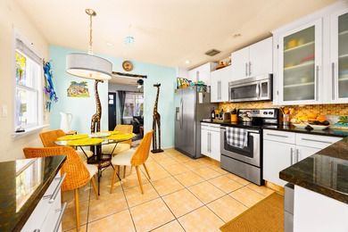 Twice featured in the Cottages of Lake Worth Tour, this is THE on Lake Worth Municipal Golf Course in Florida - for sale on GolfHomes.com, golf home, golf lot