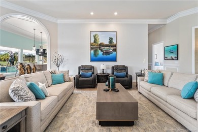 This stunning home, complete with impact windows and door and on Hobe Sound Golf Club in Florida - for sale on GolfHomes.com, golf home, golf lot