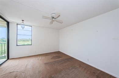 Top-Floor Condo with Panoramic Island Views! Experience the best on Isla Del Sol Yacht and Country Club in Florida - for sale on GolfHomes.com, golf home, golf lot