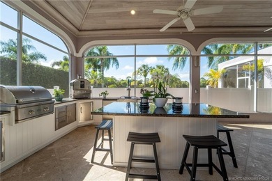 This stunning home, complete with impact windows and door and on Hobe Sound Golf Club in Florida - for sale on GolfHomes.com, golf home, golf lot