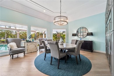 This stunning home, complete with impact windows and door and on Hobe Sound Golf Club in Florida - for sale on GolfHomes.com, golf home, golf lot