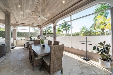 This stunning home, complete with impact windows and door and on Hobe Sound Golf Club in Florida - for sale on GolfHomes.com, golf home, golf lot